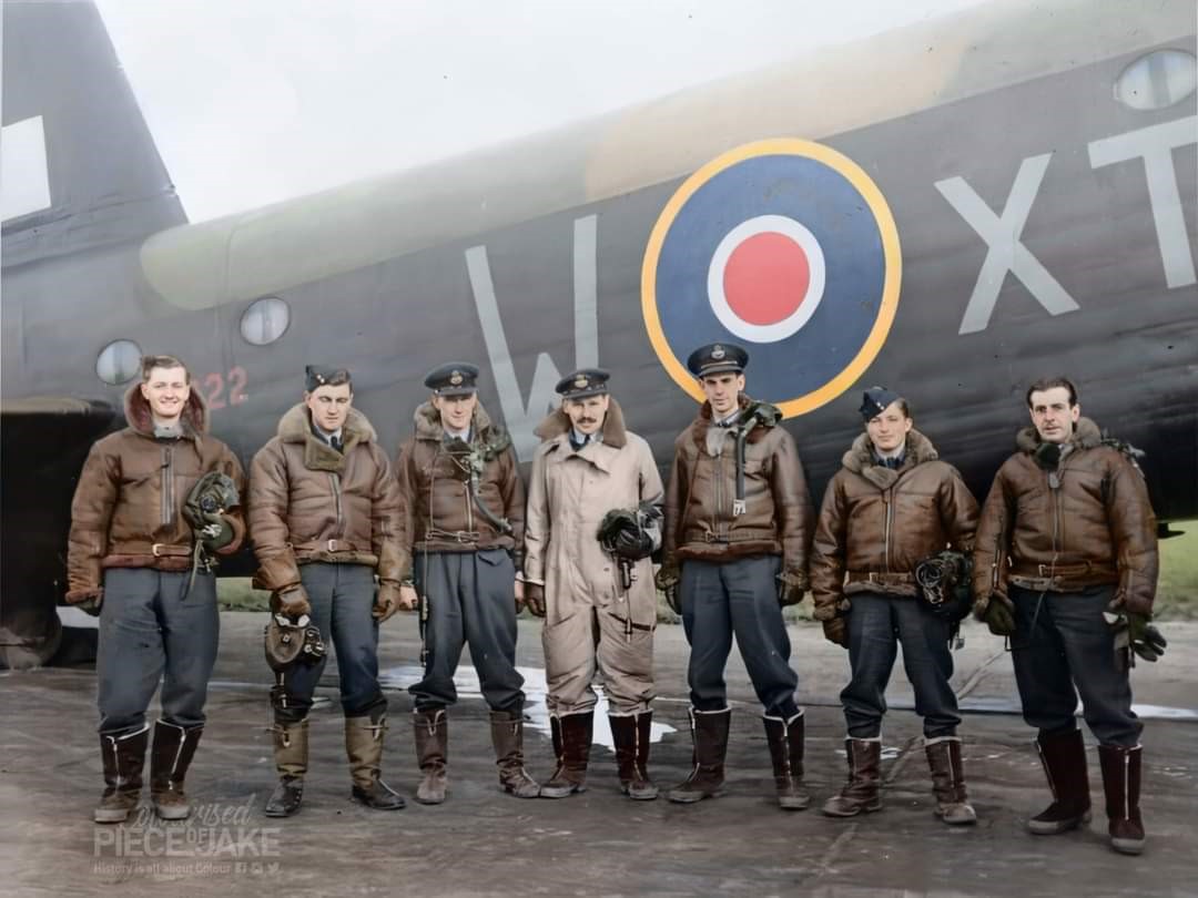 Image of RAF aviators standing by aircraft.